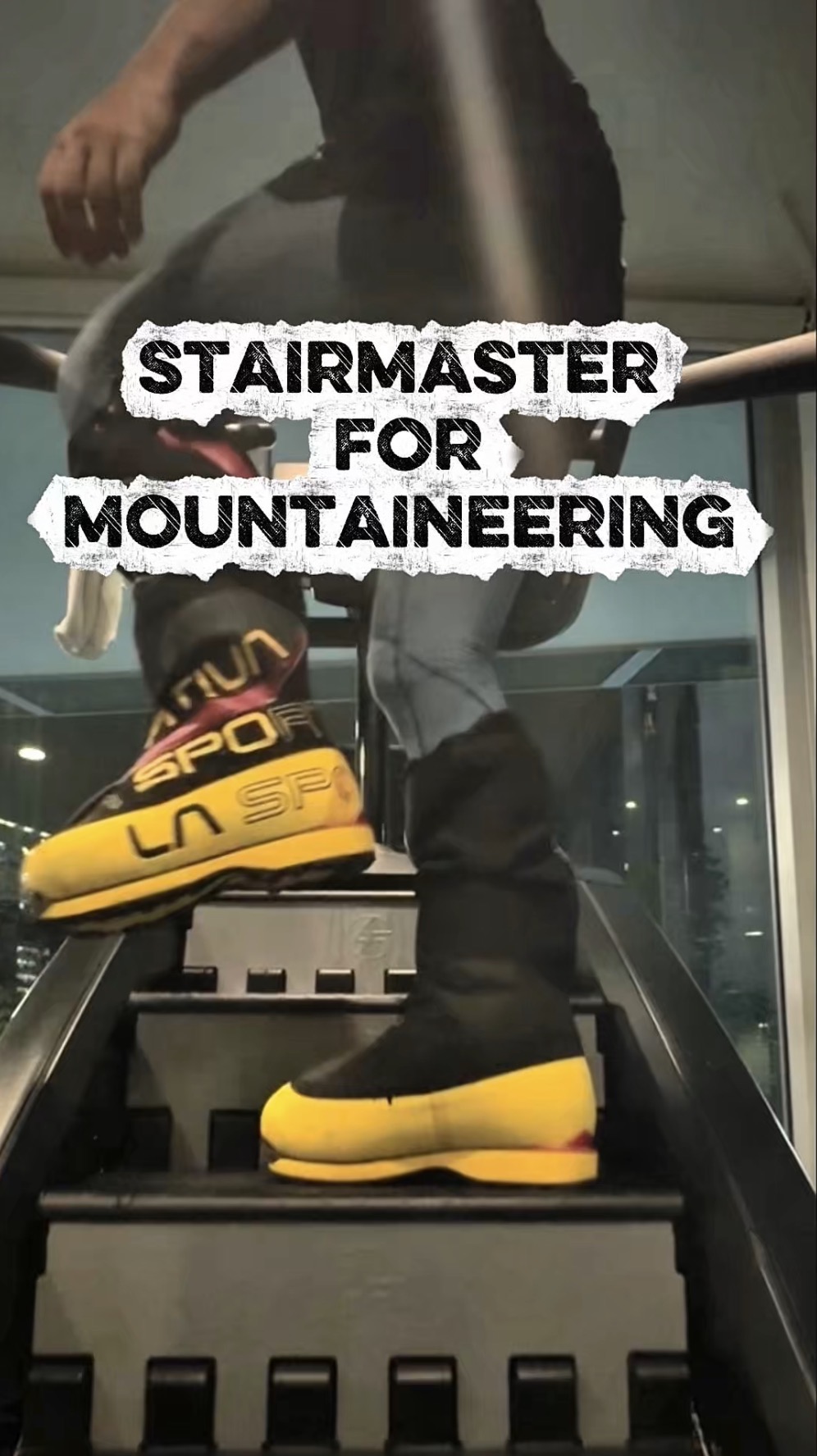 Mountaineer wearing yellow climbing boots training on a StairMaster